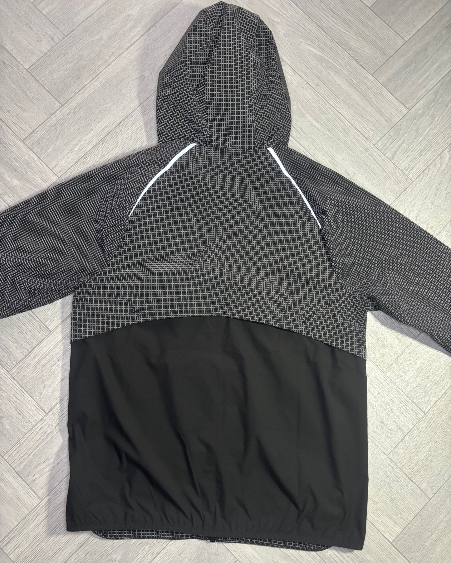 Castore Reflective Grid Lightweight Jacket (S)