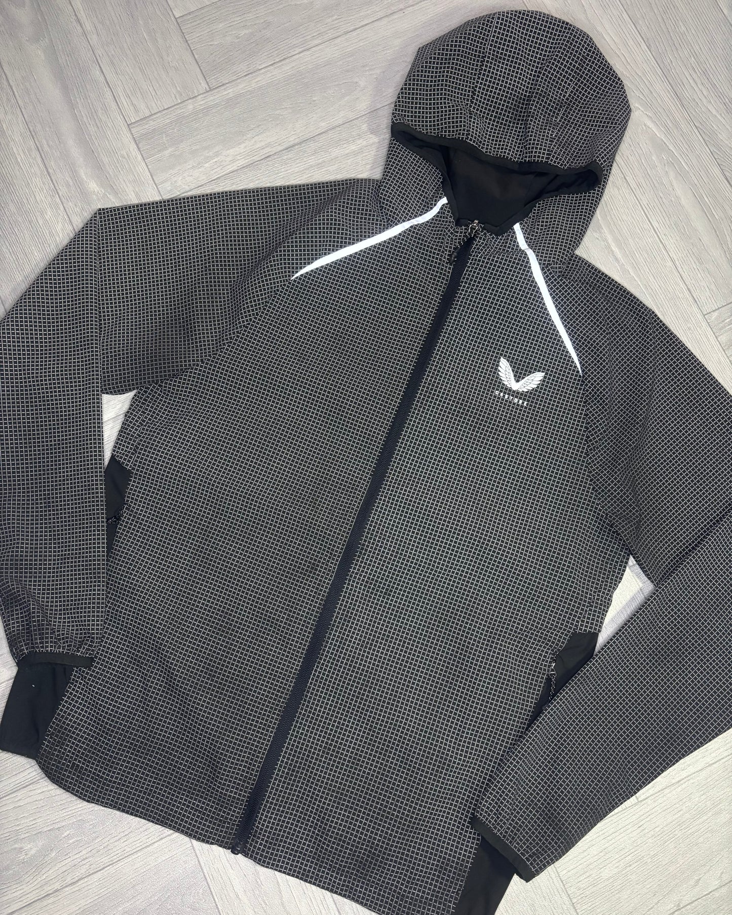 Castore Reflective Grid Lightweight Jacket (S)