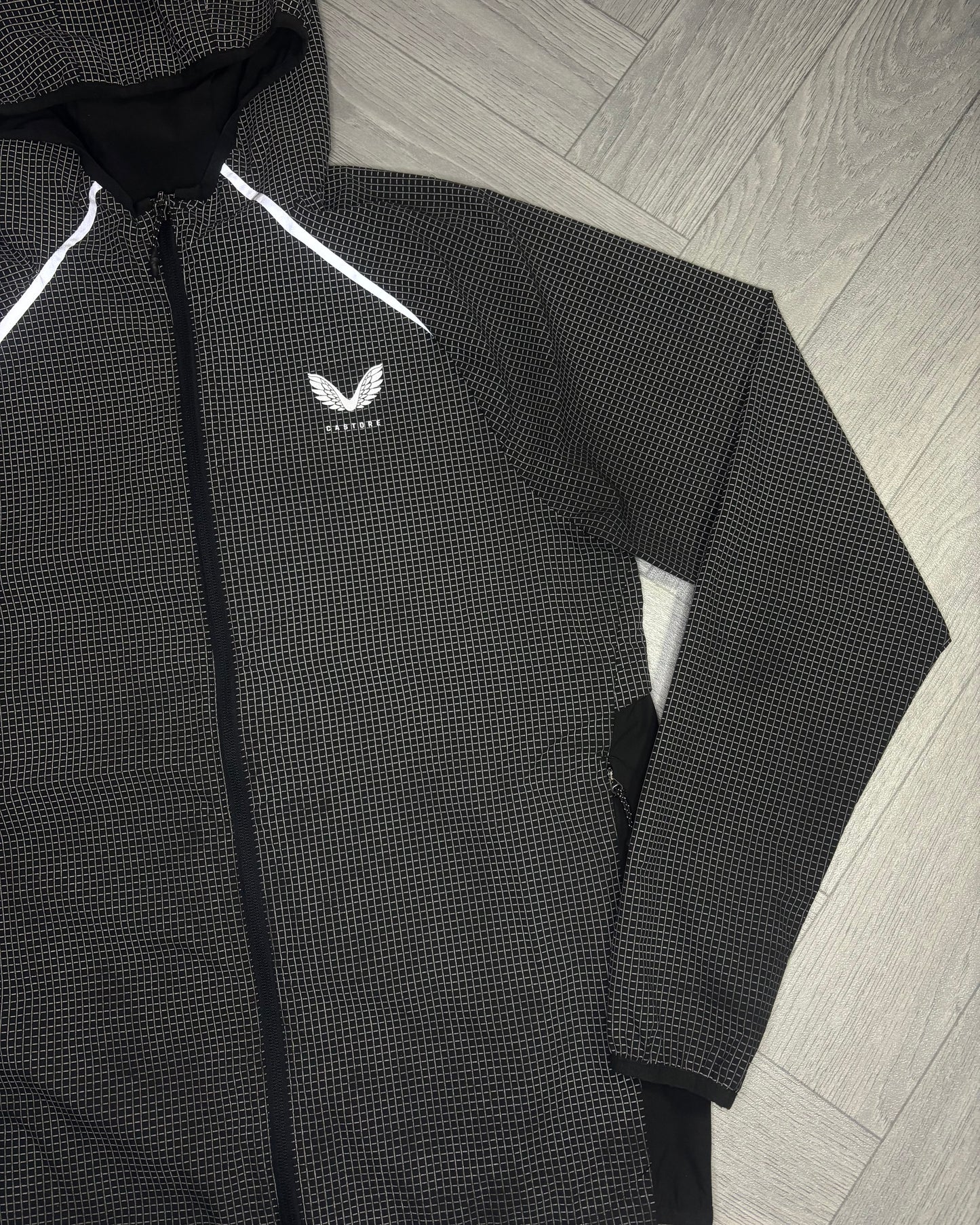 Castore Reflective Grid Lightweight Jacket (S)
