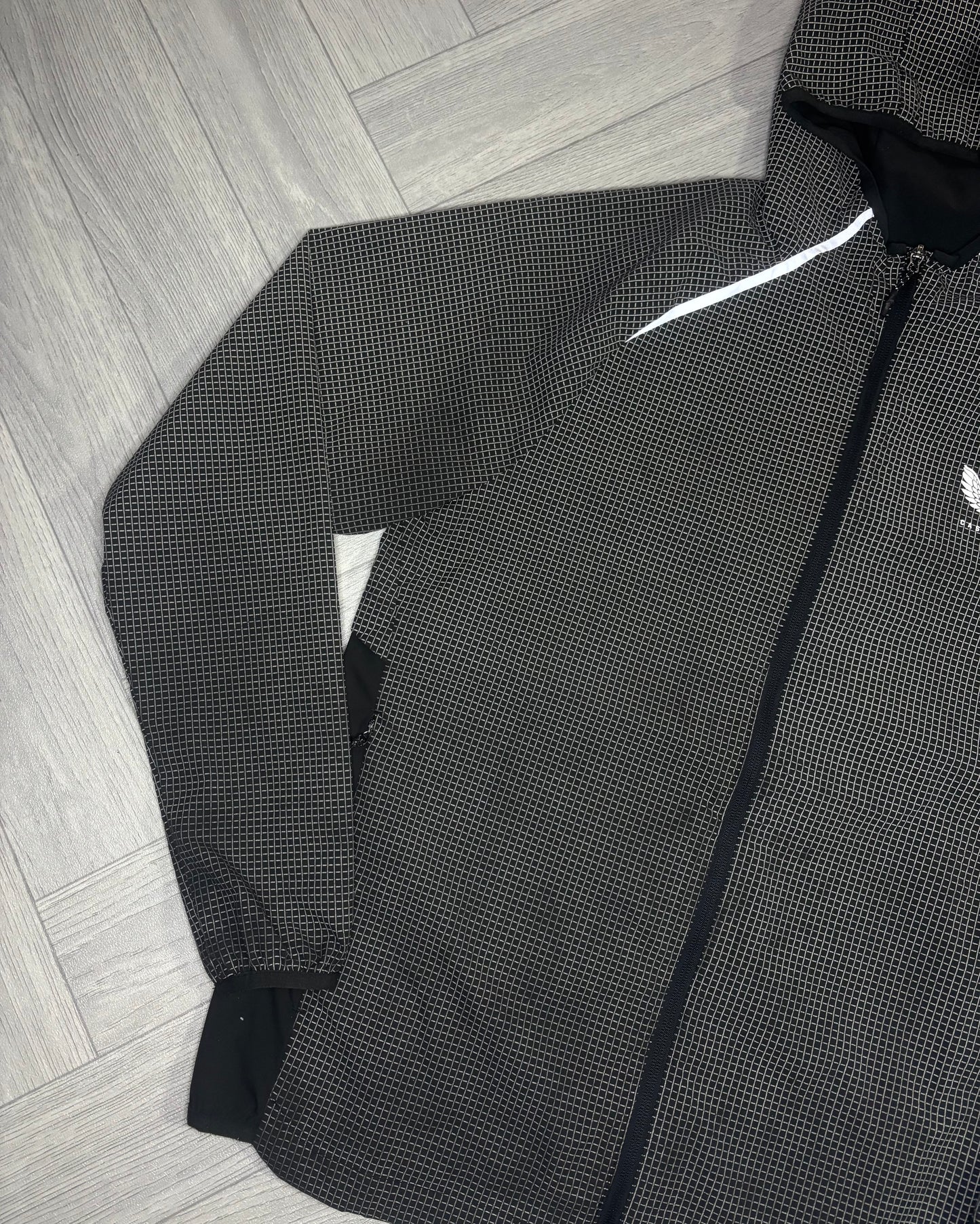 Castore Reflective Grid Lightweight Jacket (S)