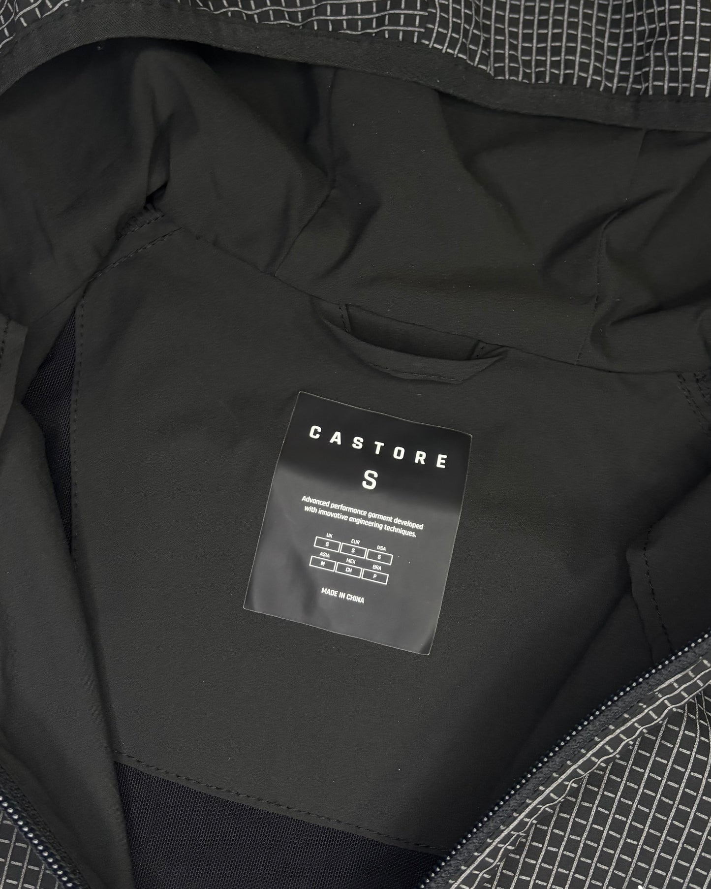 Castore Reflective Grid Lightweight Jacket (S)