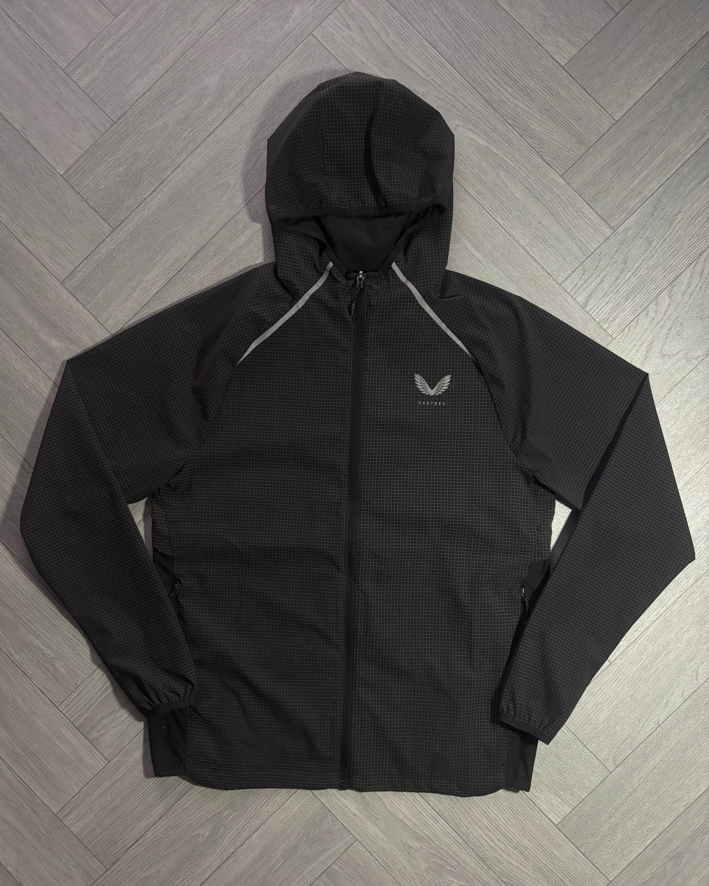 Castore Reflective Grid Lightweight Jacket (S)