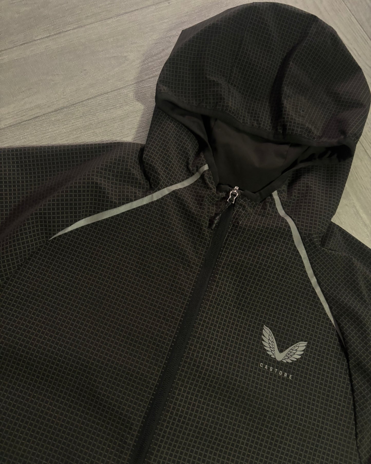 Castore Reflective Grid Lightweight Jacket (S)